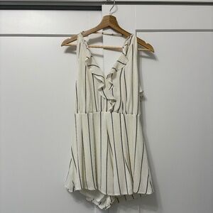 Striped open back ruffled romper